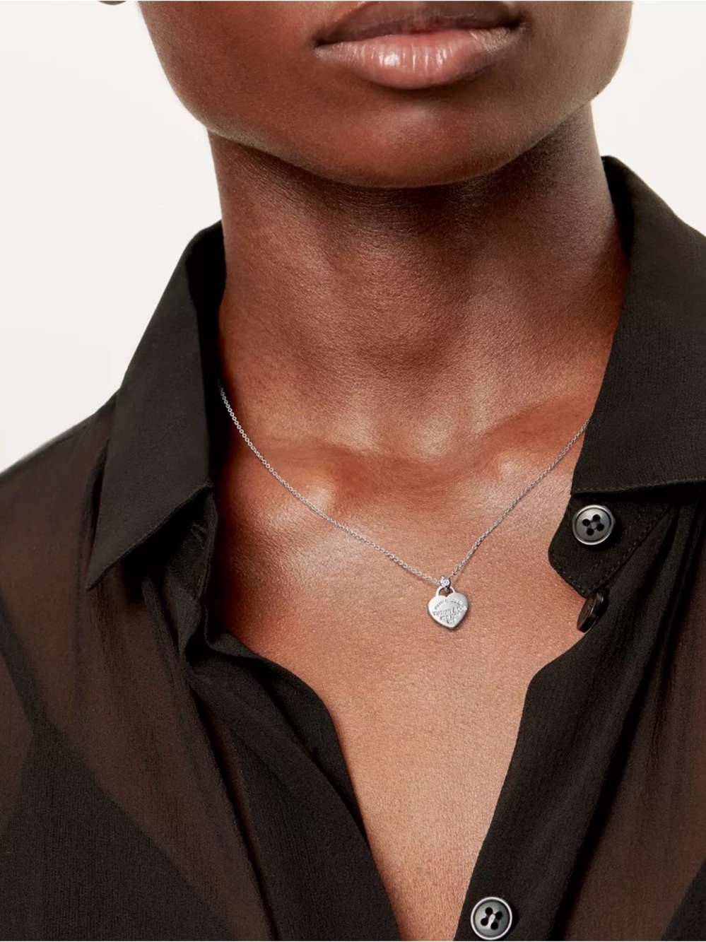 Tiffany & Co. Sterling Heart Pendant Necklace with petite diamond - Silver